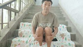 Cute Asian boy enjoys a wonderful time by ejaculating and consuming semen in the ruined stairwell on the eve of his birthday