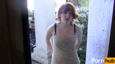 Petite redhead strips for cigarettes and gives standing blowjob