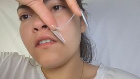 The girl catches the flu and blows her nose, snot and all.