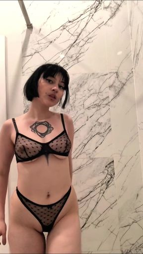 The Girl Is About to Take a Shower and Passionately Undresses and Caresses Herself
