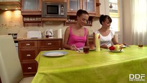 naughty coeds demetris and leda suck on man sausage atop the kitchen table