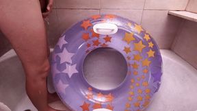 Bathroom with inflatable swim ring