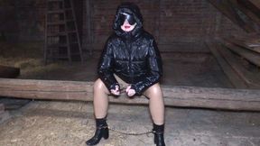 In handcuffs and a shiny down jacket in the attic