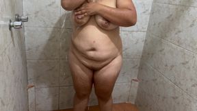 Woman Puts on a Show in a Bathroom by Letting Herself Be Filmed by Strangers While Touching Her Tits, Pussy