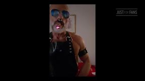 Stepdad lighting his Cigar in rubber apron