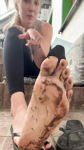 Mistress makes slave clean her dirty feet with her tongue