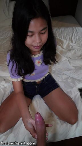 Beautiful 18 year old Thai slut gets fucked by a big white cock and cums all over her face