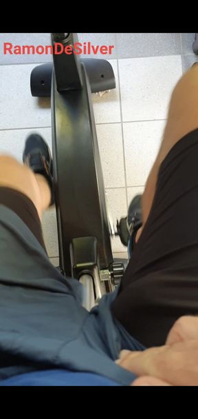 Master Ramon massages his hard cock on the ergometer