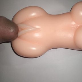 Sex doll dick rubbing.