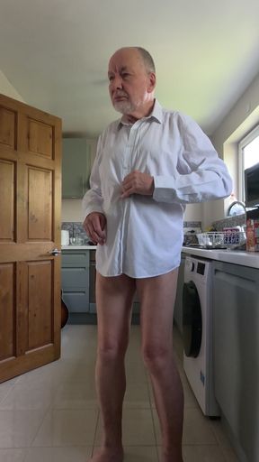 Stripping naked in the kitchen