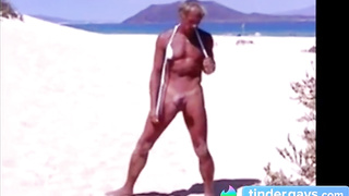 Tanned guy on beach in tiny string thong (temporarily!) 10