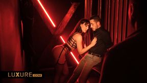 Hot brunette babe gets shared by couple in swinger club