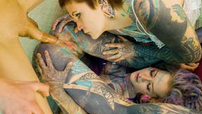 ”2 Heavy Tattoo Girls Get Butt Ravaged By A Huge Dick”