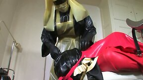 Bizarre rubber apron bondage 4 of 5