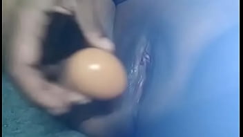 Fiji wife mastubating with an egg