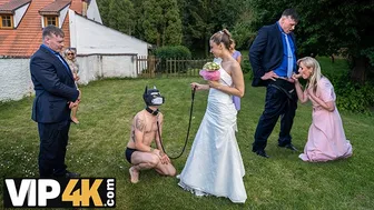 Bride in wedding dress enjoys kinky pet play with fiancee in public