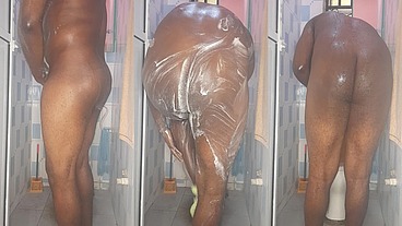 African giant fingering his tight anus while bathing