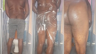 African giant fingering his tight anus while bathing