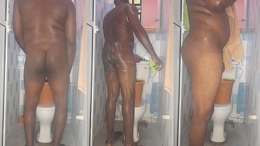 African giant fingering his tight anus while bathing