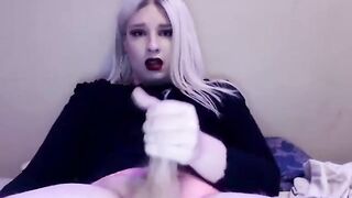 Blonde with a huge cock gives a hot handjob and gets a sticky facial