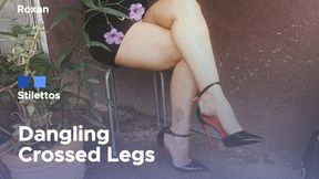 She keeps her legs crossed and her stiletto heels dangling from her feet (3)