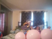 Milf with extreme long hair popping balloons and smoking cigarettes while filming up her own skirt