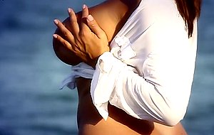 Big tits brunette sensual jane fingering at the beach