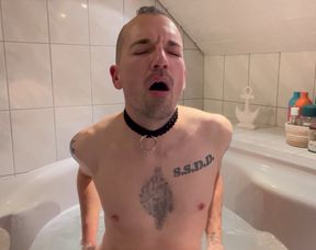 Stupid faggot slut fucks dildos in bath tub.