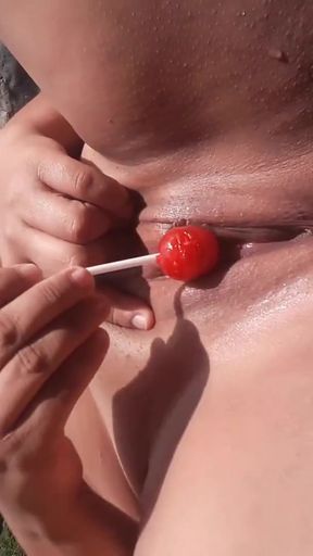 Epic moment from "Penelope Olsen naked outdoors: Playing with my pussy and a lollipop in the river near American tourists"