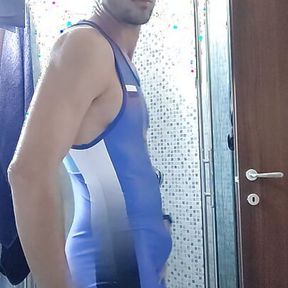 Wank in wrestling singlet