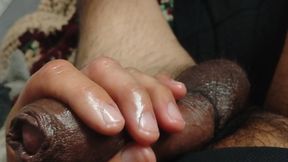 Oiled stroking cock
