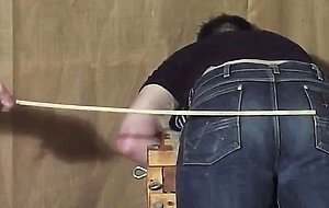 Caned over tight jeans Daddy boy