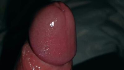 Very close-up of an over-excited penis and streams of pre-cum!