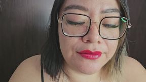 smoking while I put red lipstick on my lips