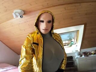 Doll costume up with female mask and slender jeans