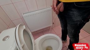 Guy Pisses in a Public Toilet and Takes a Selfie