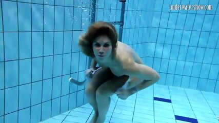 Sexy blonde Monica gets horny in the pool