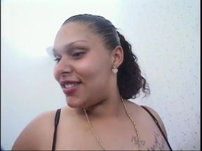 Thick woman is on her knees sucking on the ebony cock