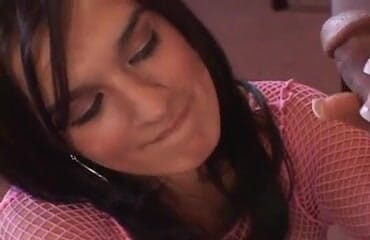 Busty Mexican with brunette hair gives handjob