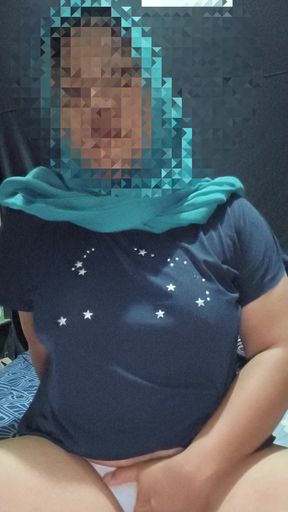 Blue hijab Muslim woman with seductive black t-shirt