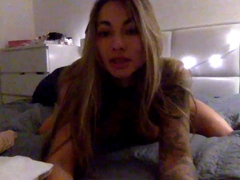 Brunette toys her ass on webcam