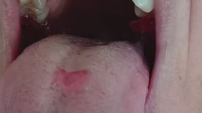 Chewing a red gummy bear slow motion