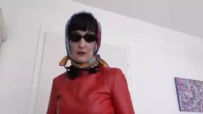 Mature MILF in fashion show seduces with glasses and scarf