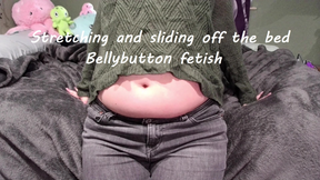 Stretching and sliding off bed: bellybutton fetish 2