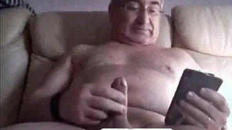 Spanish daddy bear strokes his hard cock on webcam