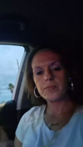 Riding in the car and doing selfie of me smoking cigarette