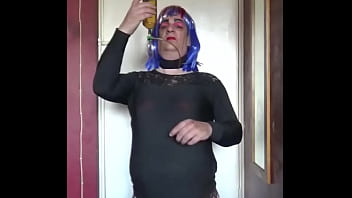 crossdresser films himself swallowing pee