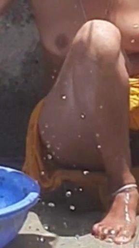 Memorable moment from &quot;Desi stepsister is taking a bath in the open bathroom, undressing and showing beautiful head body,&quot;