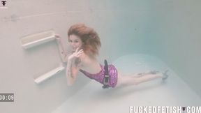 hd Slut relaxes underwater with vibrator after party