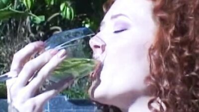 Mature Blonde MILF Drenches Glass with Golden Stream Outdoors